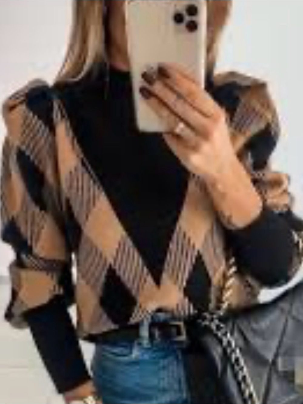 Puff sleeve women’s peachy orange and black sweater top, diamond pattern